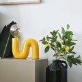 żółta błyszcząca lampka stołowa POP SERPENT Lyoma LX23817